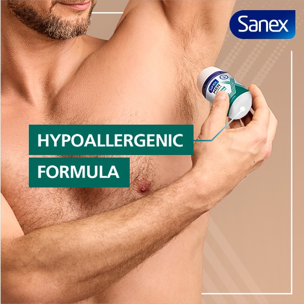 Man rolling Sanex Men Sensitive Antiperspirant Roll-on, on his armpit.