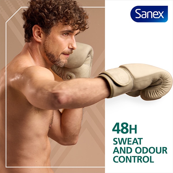 A man with boxing gloves on, throwing a jab.