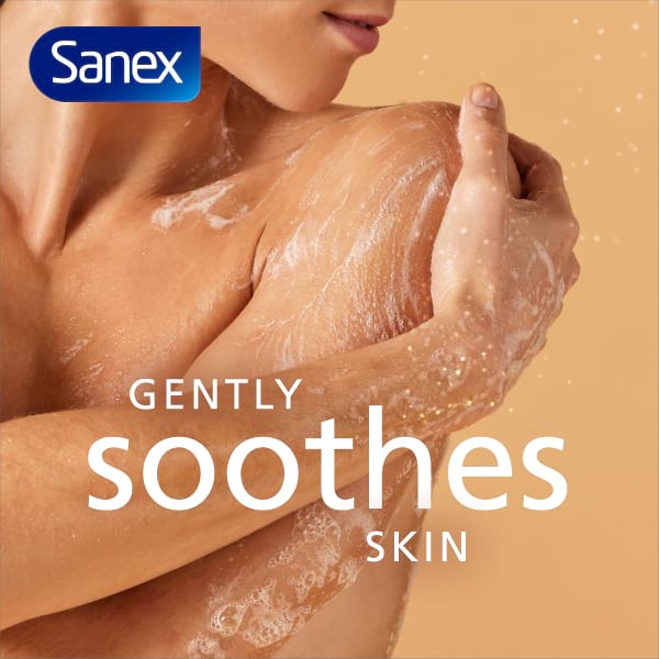Sanex Expert Skin Health Sensitive Shower Gel Close-up of a man holding his shoulder across his body.